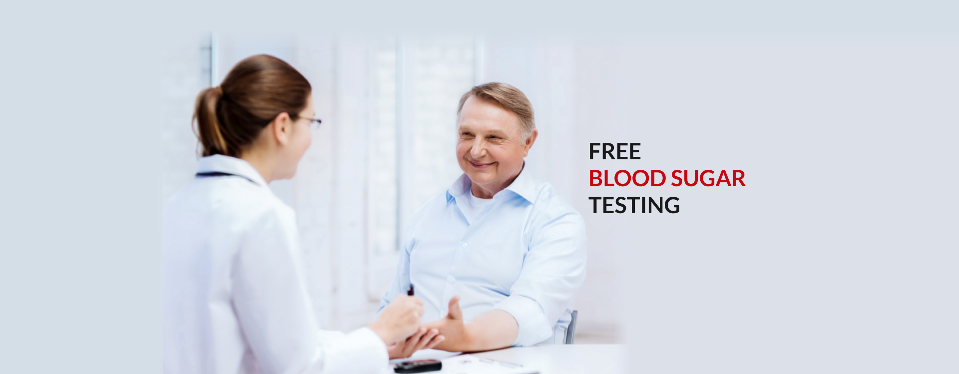doctor testing the blood sugar of the elderly man