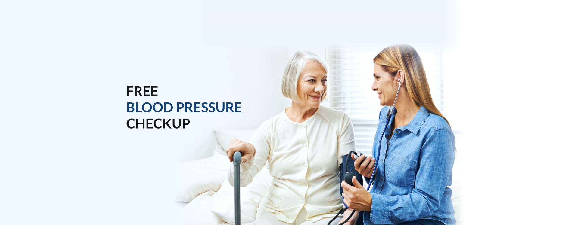 nurse checked the blood pressure of the elderly woman